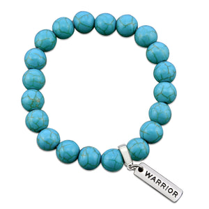 Turquoise stone bead bracelet with silver charms with meaningful words. 