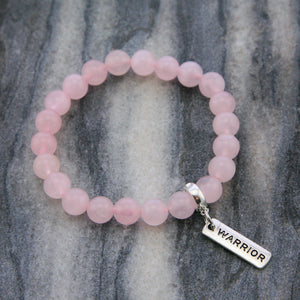 Rose Quartz 8mm stone bracelet with silver warrior word charm and clip. 