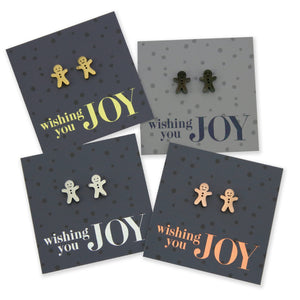 Silver, rose gold, gold and black stainless steel gingerbread cookies on foil wishing you joy card.